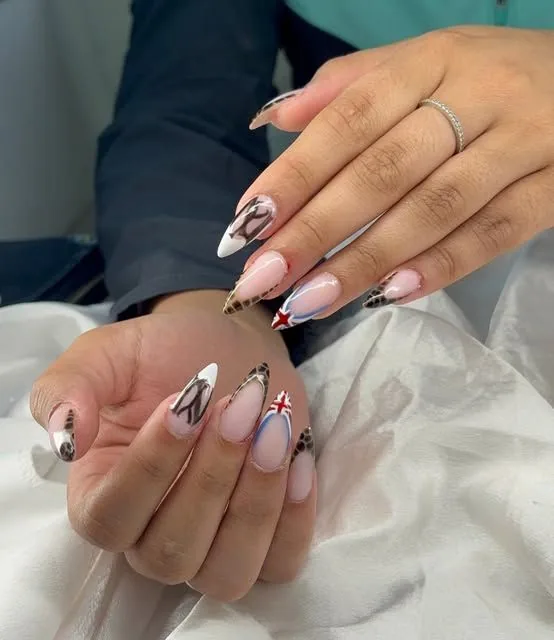 Hand-painted art, acrylic nails by Saya Aesthetics